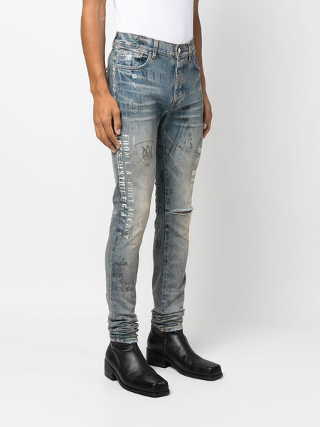 AMIRI slim-fit illustration print jeans – TOPDROP-NEWYORK