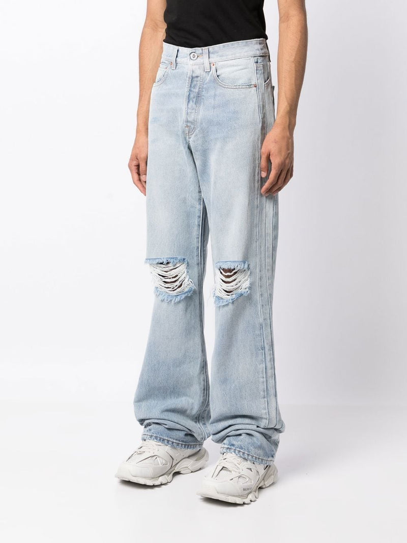 VETEMENTS ripped-knee wide jeans