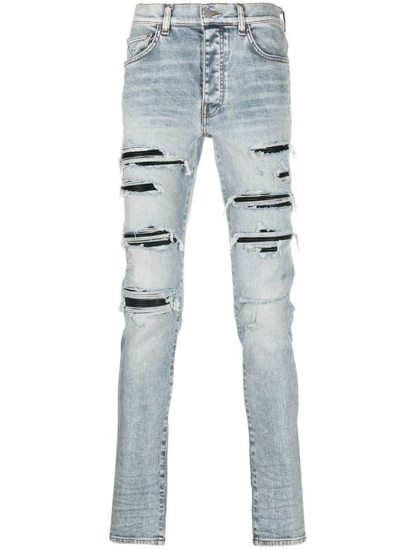 AMIRI distressed skinny jeans