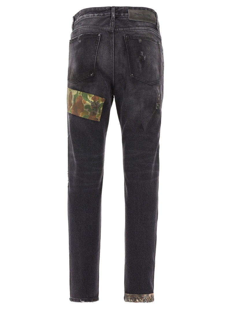 Palm Angels Palm Angels Mid-Rise Distressed Patchwork Jeans